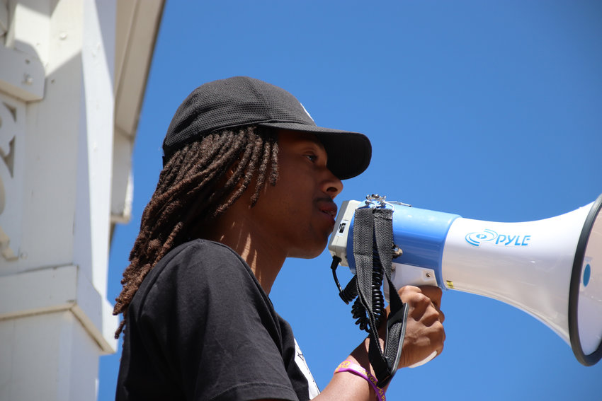 Quincy Shannon speaks to protesters on June 7 at a demonstration in Castle Rock decrying police brutaliyt and racial injustice.